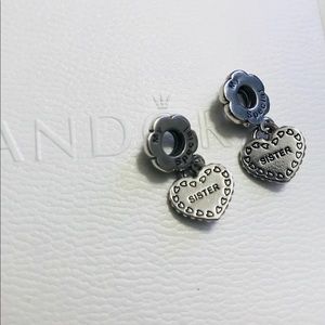 Two Authentic Pandora Sister Charms